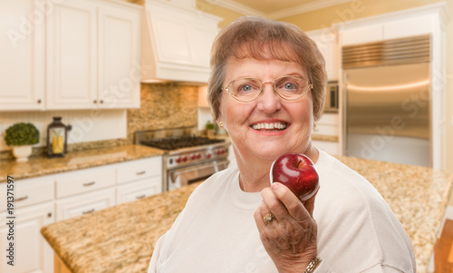 Happy Senior Adult Woman wi...