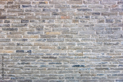 Old worn brick wall texture background.