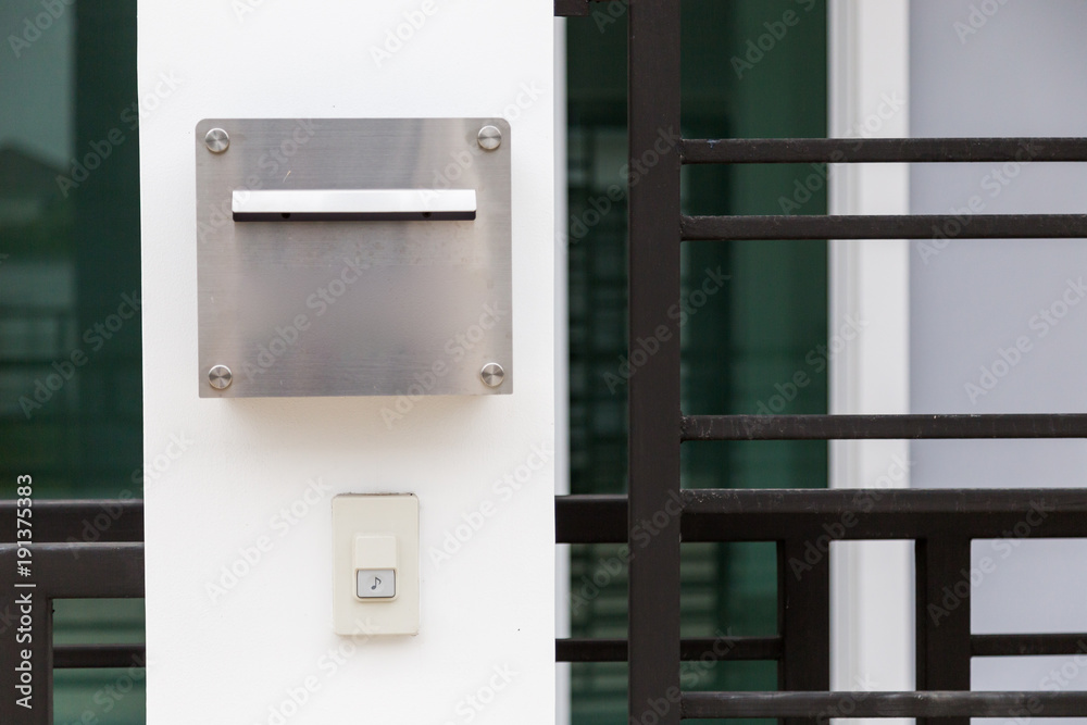 Ringing bell alarm and mail box in front of house. Ringing bell alarm and mail box in front of house.