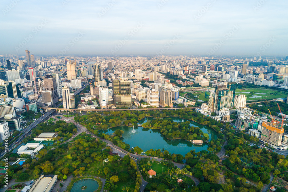 Modern city downtown of Bangkok with green public park