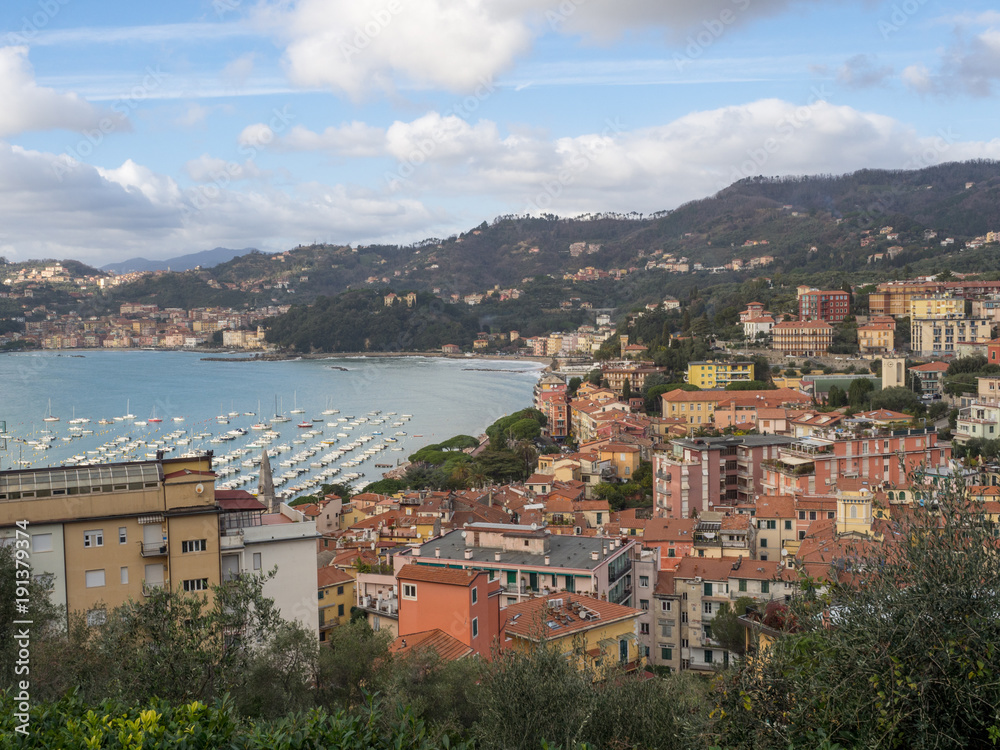 Beautiful view of small town Lerici on Ligurian coast of Italy in province of La Spezia. Castle and port of Lerici. Bright colored Italian houses on the shore of the Mediterranean Sea. January 2018