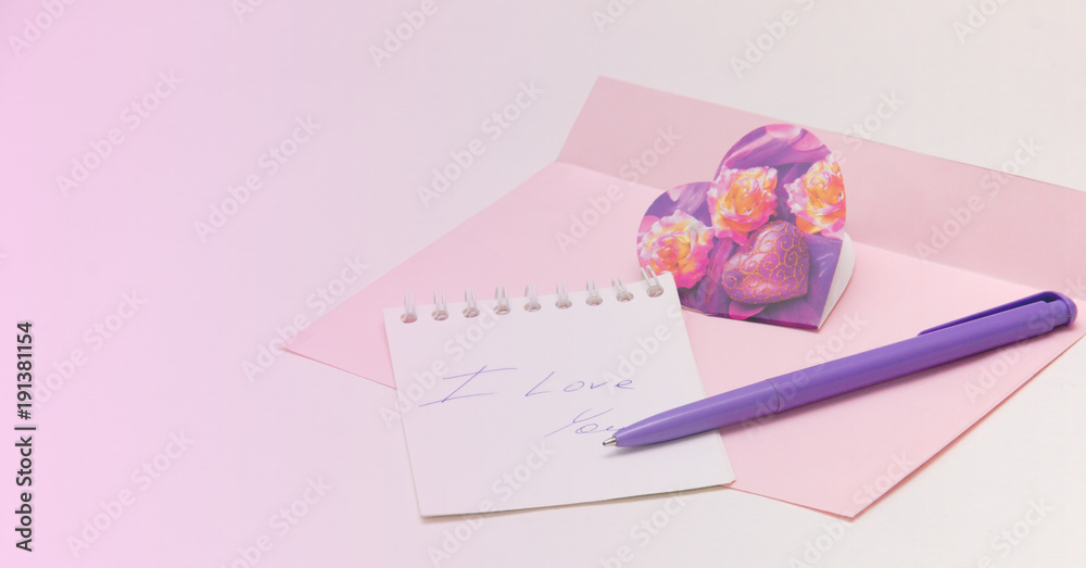 letter, Valentine card, pen, notebook on table