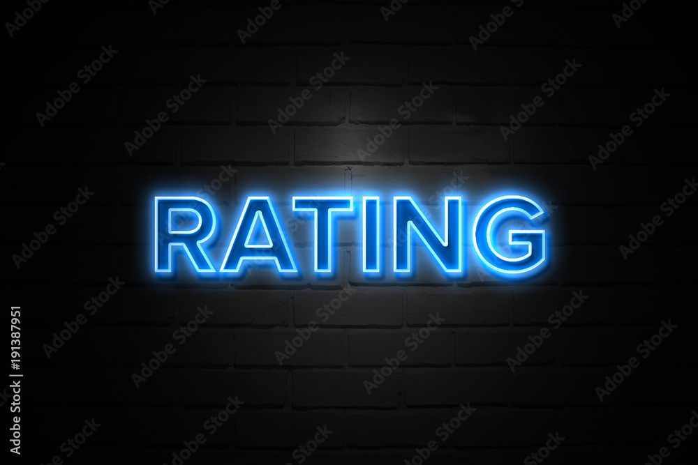 Rating neon Sign on brickwall
