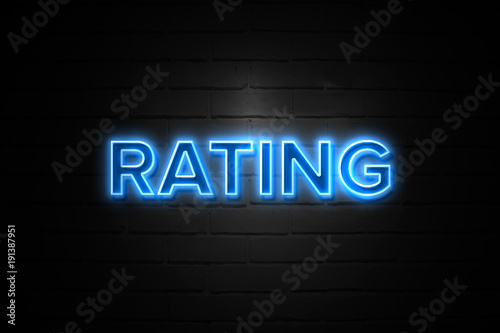 Rating neon Sign on brickwall