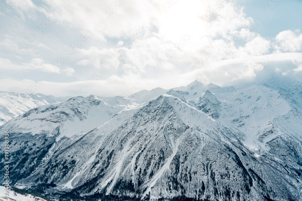 Snow-capped peaks of the Caucasus Mountains. Caucasian landscape Snow-capped peaks of the Caucasus Mountains. Caucasian landscape
