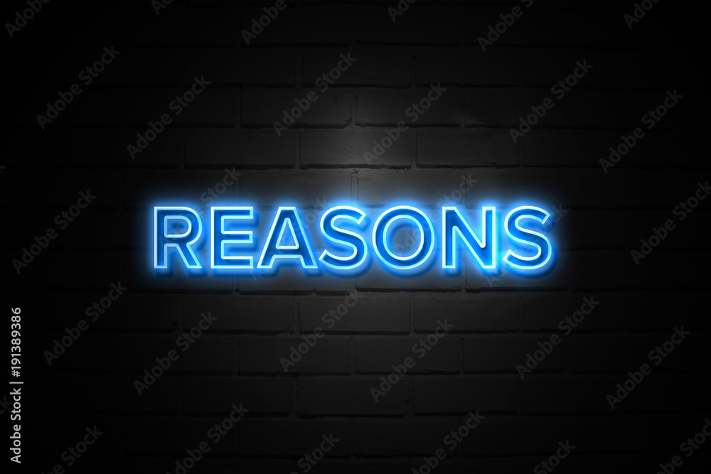 Reasons neon Sign on brickwall