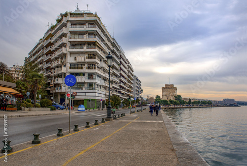 View of famous white tower and buildings of leoforos Nikis at seafront. Thessaloniki, Greece