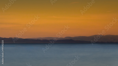 pastel bay sky and mountains