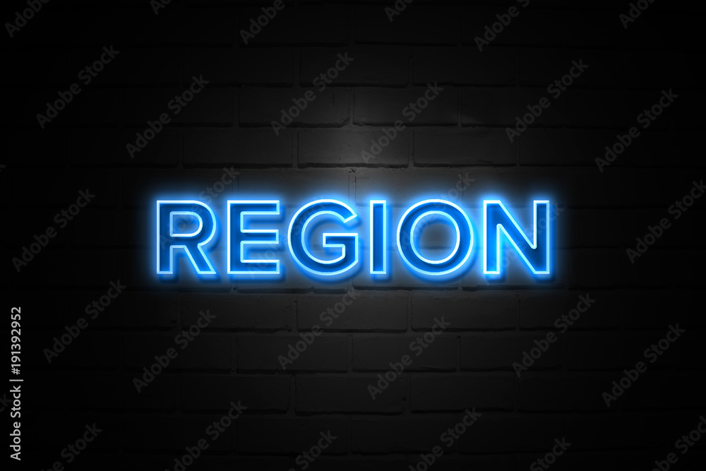 Region neon Sign on brickwall