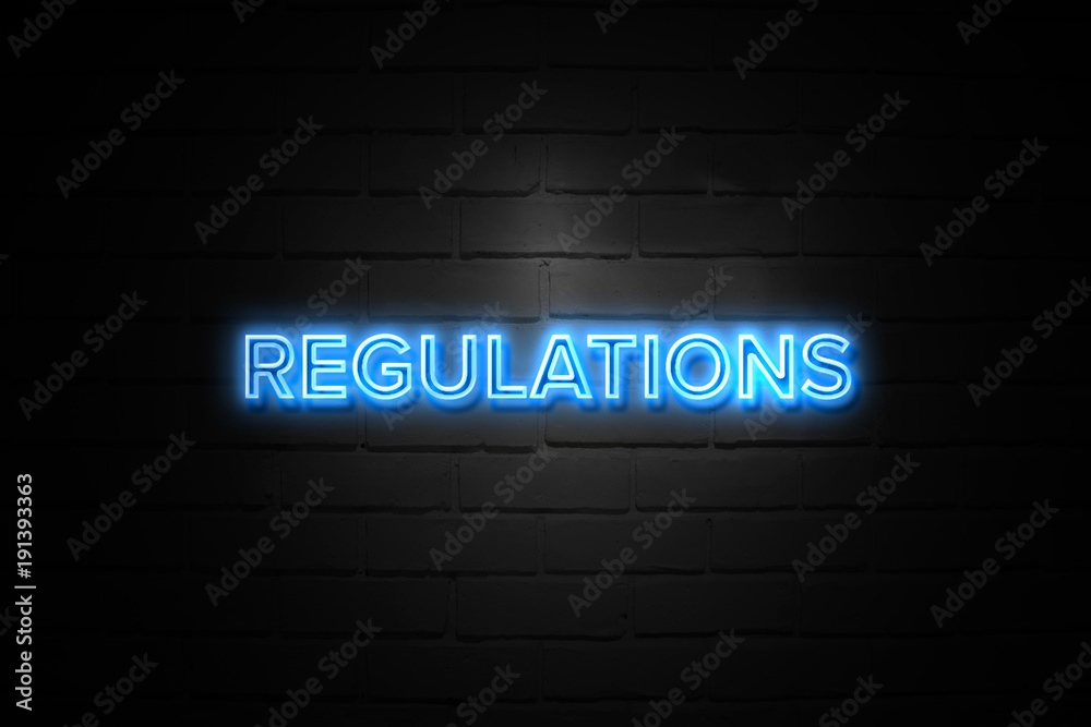 Regulations neon Sign on brickwall Regulations neon Sign on brickwall