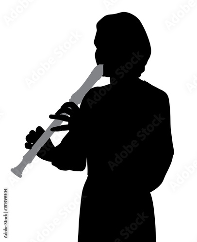 Woman playing recorder flute