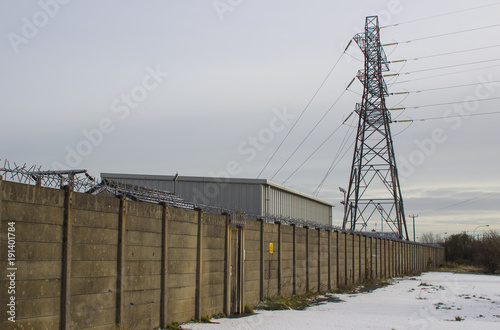 A tall electricity power supply pylon carrying high voltage electricity into the supply grid in Bangor County Down in Northern Ireland © Michael
