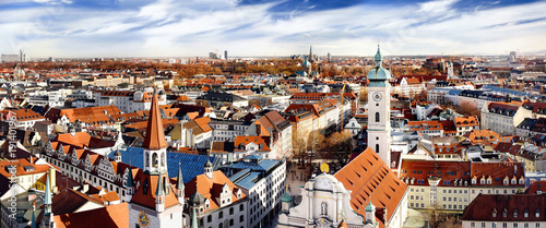 Munich center panoramic cityscape view with Old Town Hall and Heiliggeistkirche photo