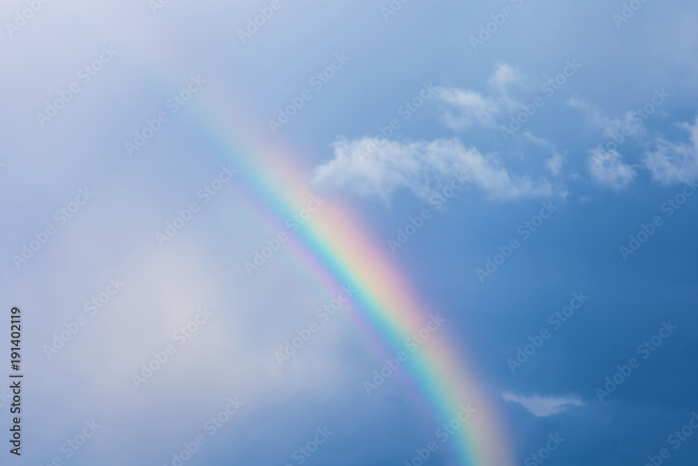 Rainbow on blue sky, natural phenomenon