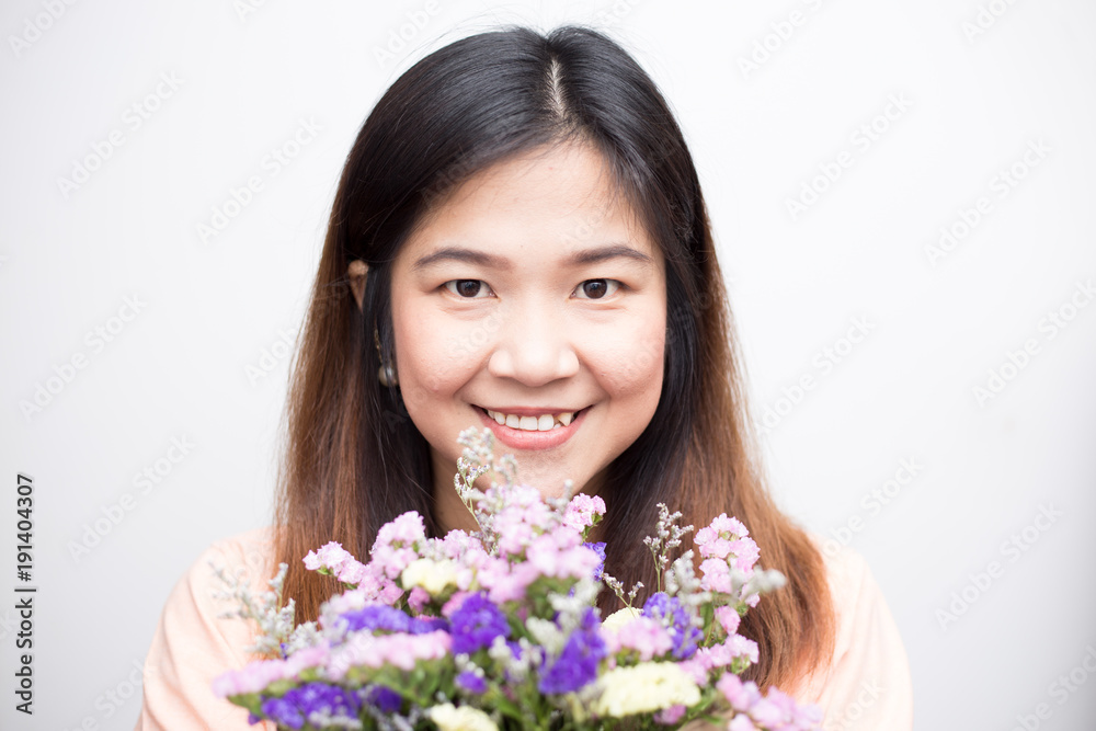 Beautiful asian women with colourful flower bouquet smiling Beautiful asian women with colourful flower bouquet smiling