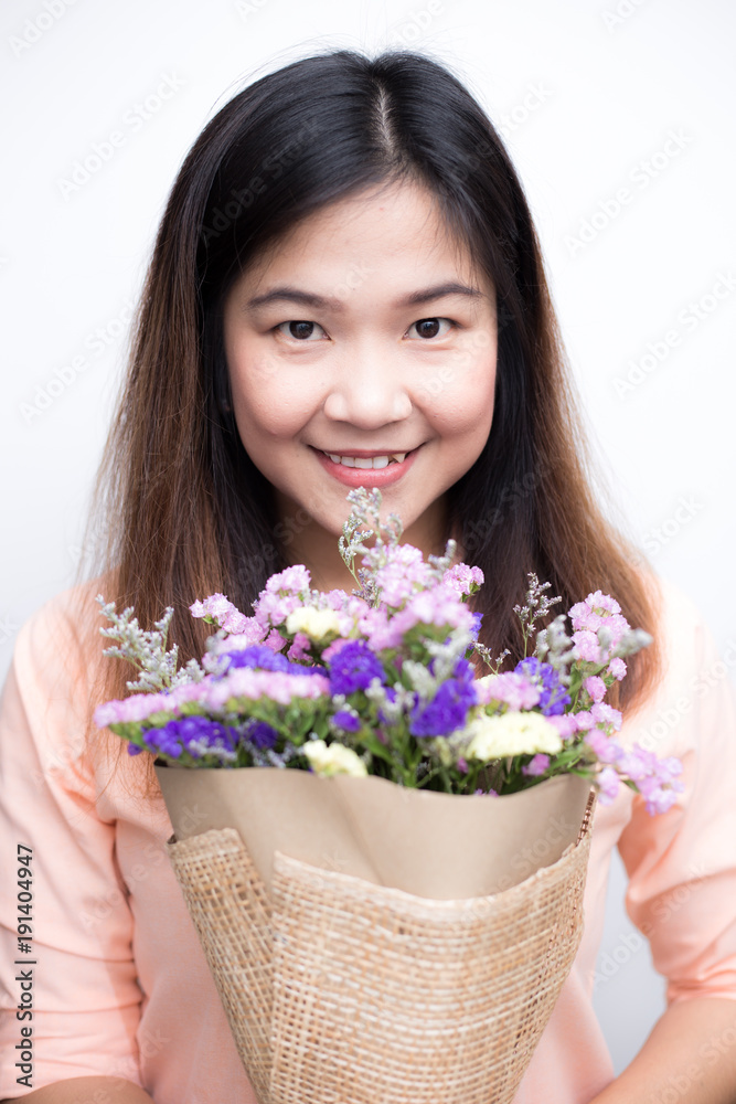 Beautiful asian women with colourful flower bouquet smiling Beautiful asian women with colourful flower bouquet smiling