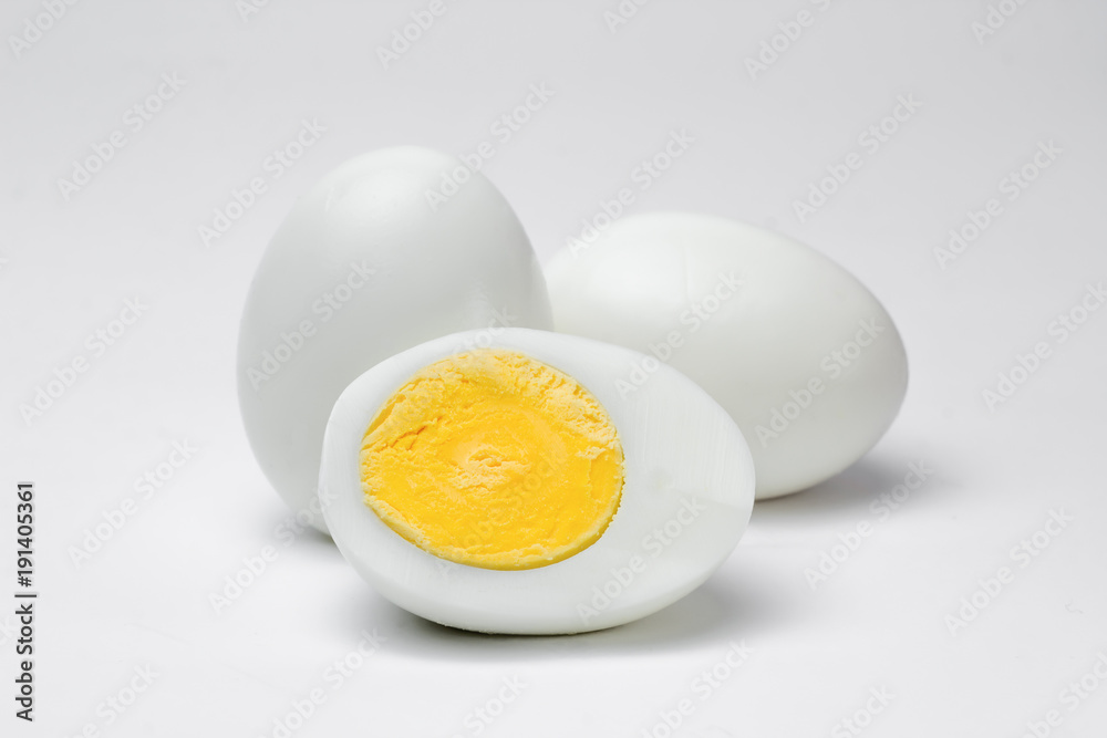 Boiled chicken eggs on a white background. Boiled chicken eggs on a white background.