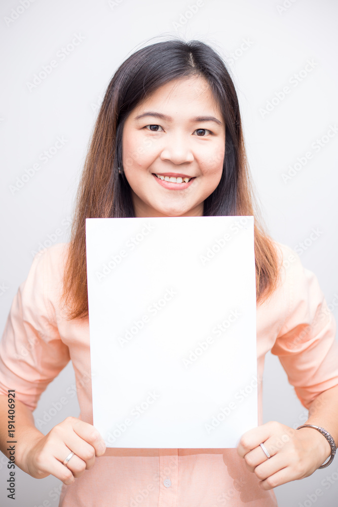 Business women holding blank white paper for put message Business women holding blank white paper for put message