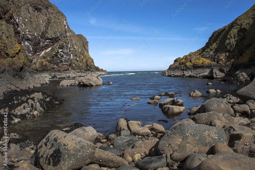 Beautiful landscape. Cliffs, rocks and the sea. Peterhead in Scotland, Aberdeenshire, United Kingdom.