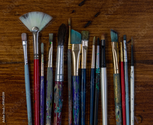 Paint Brushes on Wooden Table