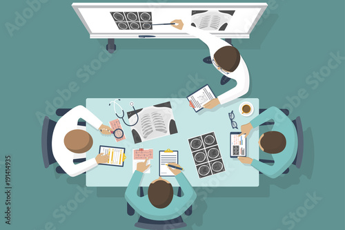 Training medical. Medical education. Doctor training. Flat. Lecture to trainees doctors. Medical conference. Discussions team of medical investigations. Training doctors.Mentor at blackboard.