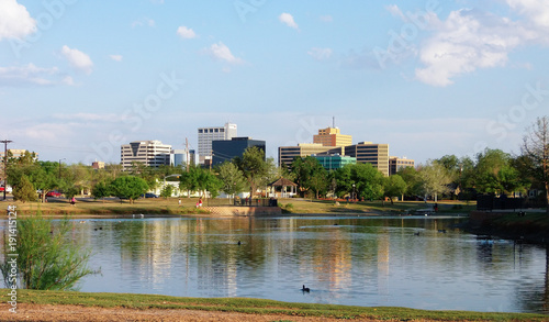 Downtown Midland, Texas on a Sunny Day as Seen Over the Pond at Wadley Barron Park photo