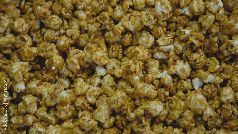 Close up popcorn background with caramel 4K Close up popcorn background with caramel 4K