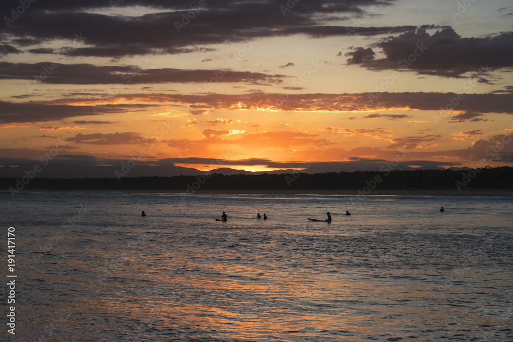 Australian Surfers Under the Sunset Australian Surfers Under the Sunset