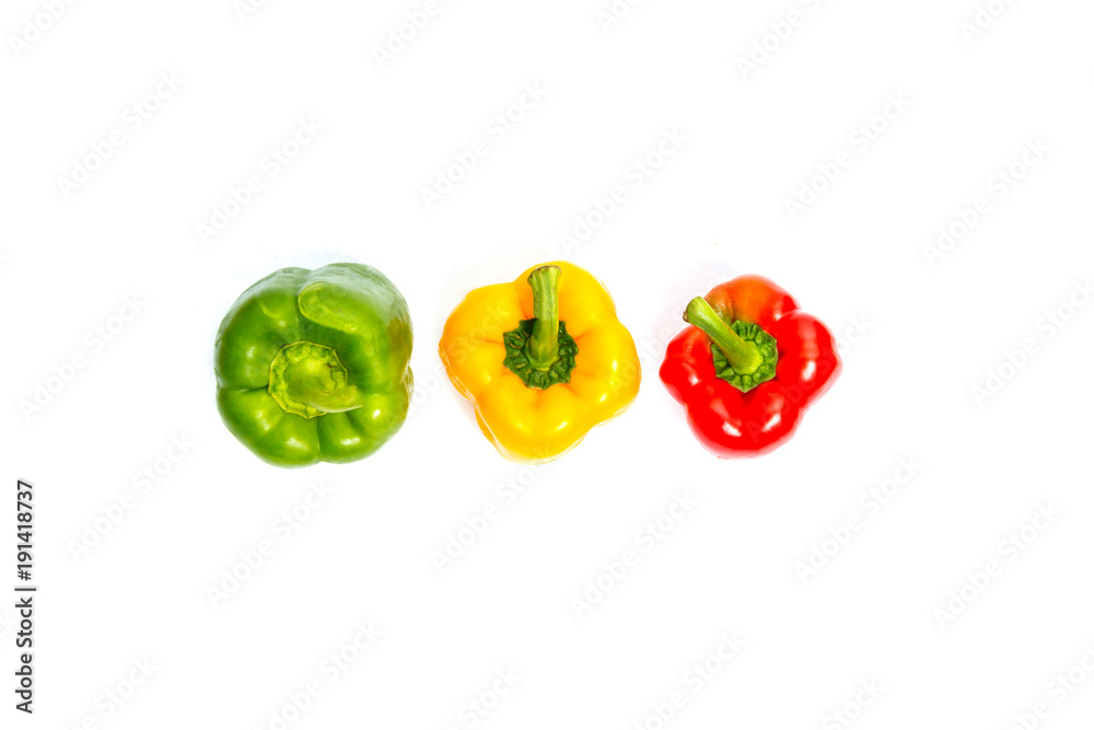 Fresh vegetables Three sweet Red, Yellow, Green Peppers isolated on white background. Fresh vegetables Three sweet Red, Yellow, Green Peppers isolated on white background.
