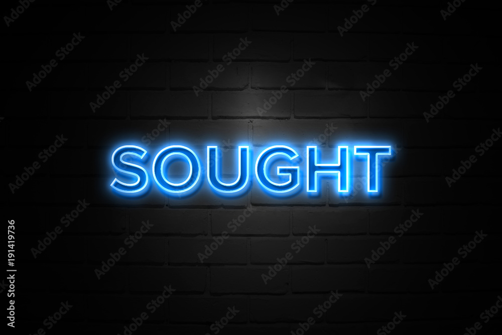 Sought neon Sign on brickwall Sought neon Sign on brickwall