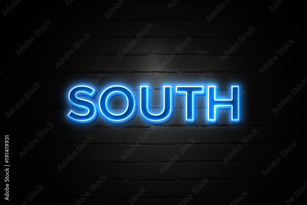 South neon Sign on brickwall South neon Sign on brickwall