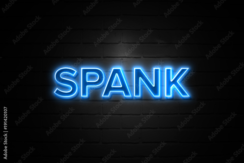 Wall Mural Spank neon Sign on brickwall