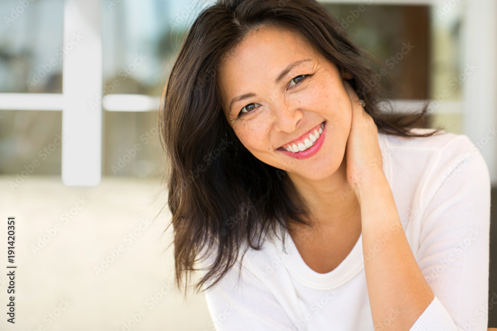 Portrait of an Asian woman smiling. Portrait of an Asian woman smiling.