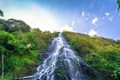 Baños - August 20, 2018: High waterfall in the town of Baños, Ecuador