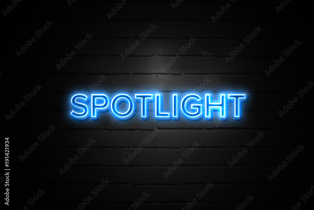 Spotlight neon Sign on brickwall - obrazy, fototapety, plakaty 