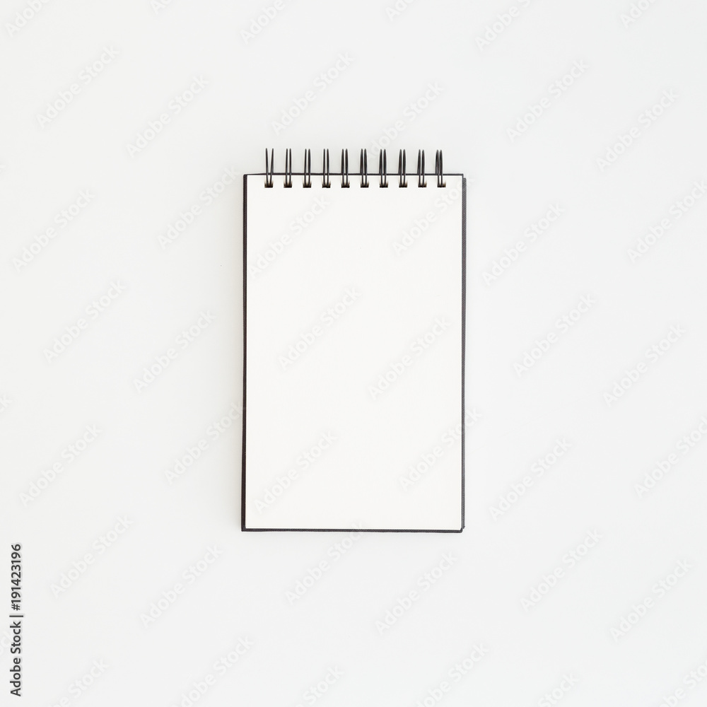 Spiral blank notebook paper for mock up. Flat lay. Spiral blank notebook paper for mock up. Flat lay.