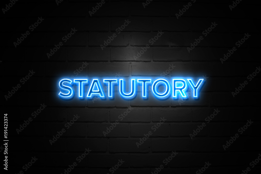 Statutory neon Sign on brickwall Statutory neon Sign on brickwall