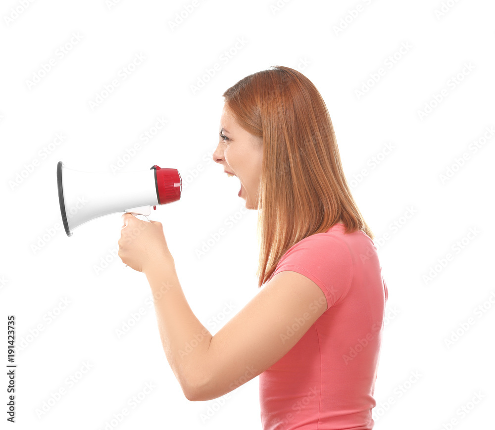 Angry woman using megaphone against white background Angry woman using megaphone against white background