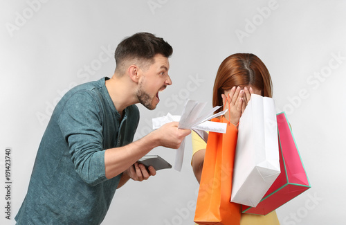 Angry man scolding his wife...