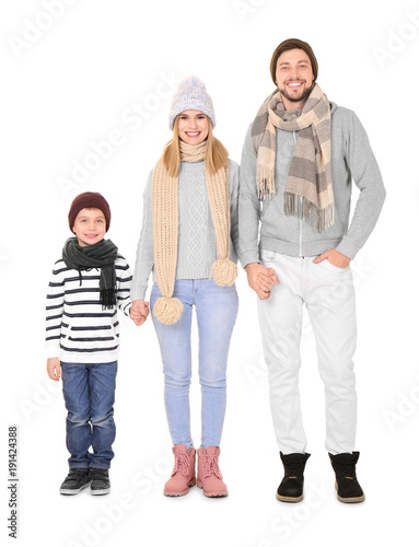 Happy family in warm clothi...