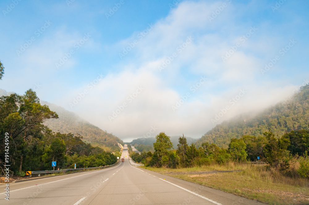 Long countryside road, highway on sunny day