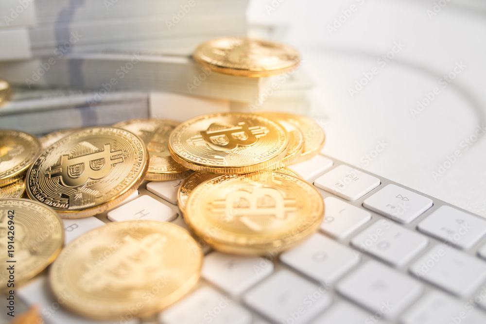 Bitcoin with little figure on keyboard Bitcoin with little figure on keyboard