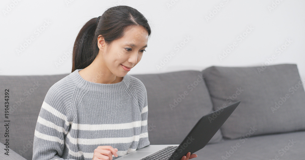Woman use of laptop computer at home Woman use of laptop computer at home
