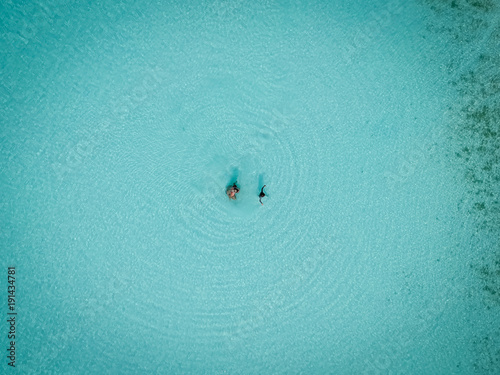 Drone photo of mother and child in Sapodilla Bay, Providenciales, Turks and Caicos