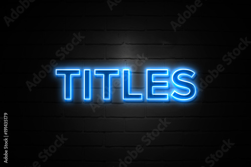 Titles neon Sign on brickwall