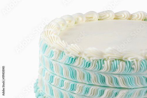 Close up on white cream cake isolated on white background