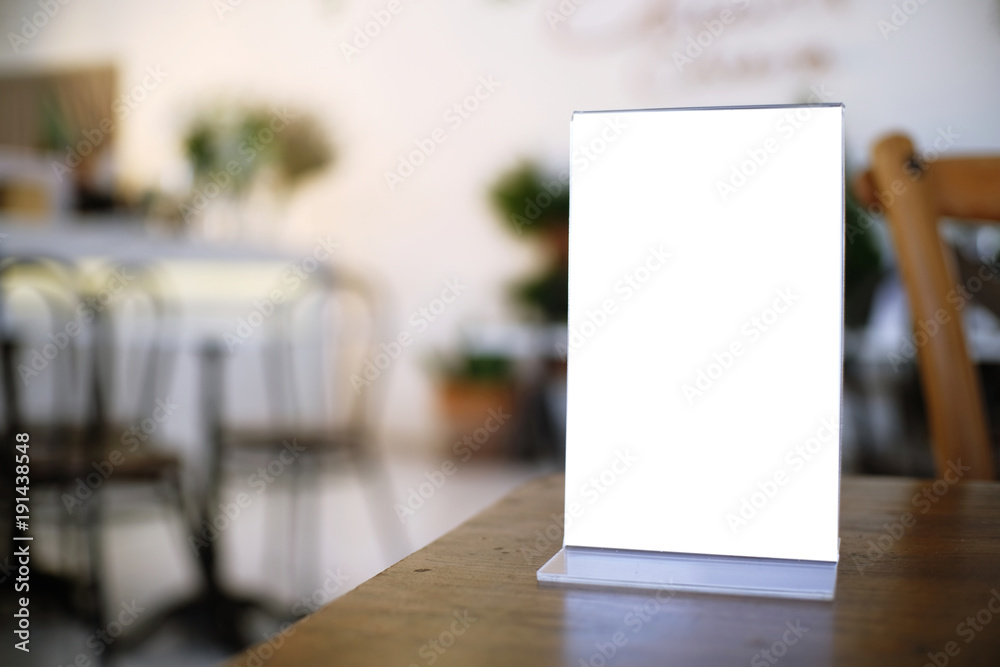 Menu frame standing on wood table in Bar restaurant cafe. space for text marketing promotion. Menu frame standing on wood table in Bar restaurant cafe. space for text marketing promotion.