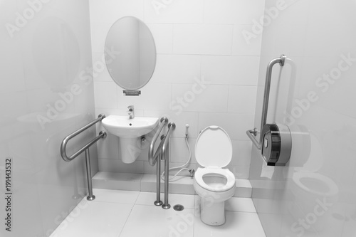 Inside disable toilet , black and white background. disable concept.