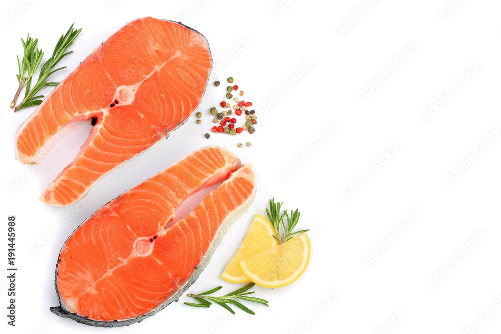 Slice of red fish salmon with lemon, rosemary isolated on white background with copy space for your text. Top view Slice of red fish salmon with lemon, rosemary isolated on white background with copy space for your text. Top view