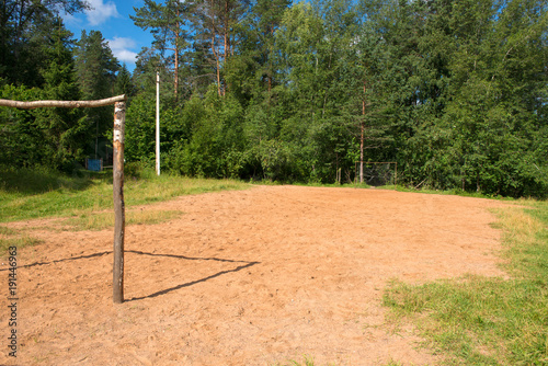 Rustic football field with homemade wooden gates